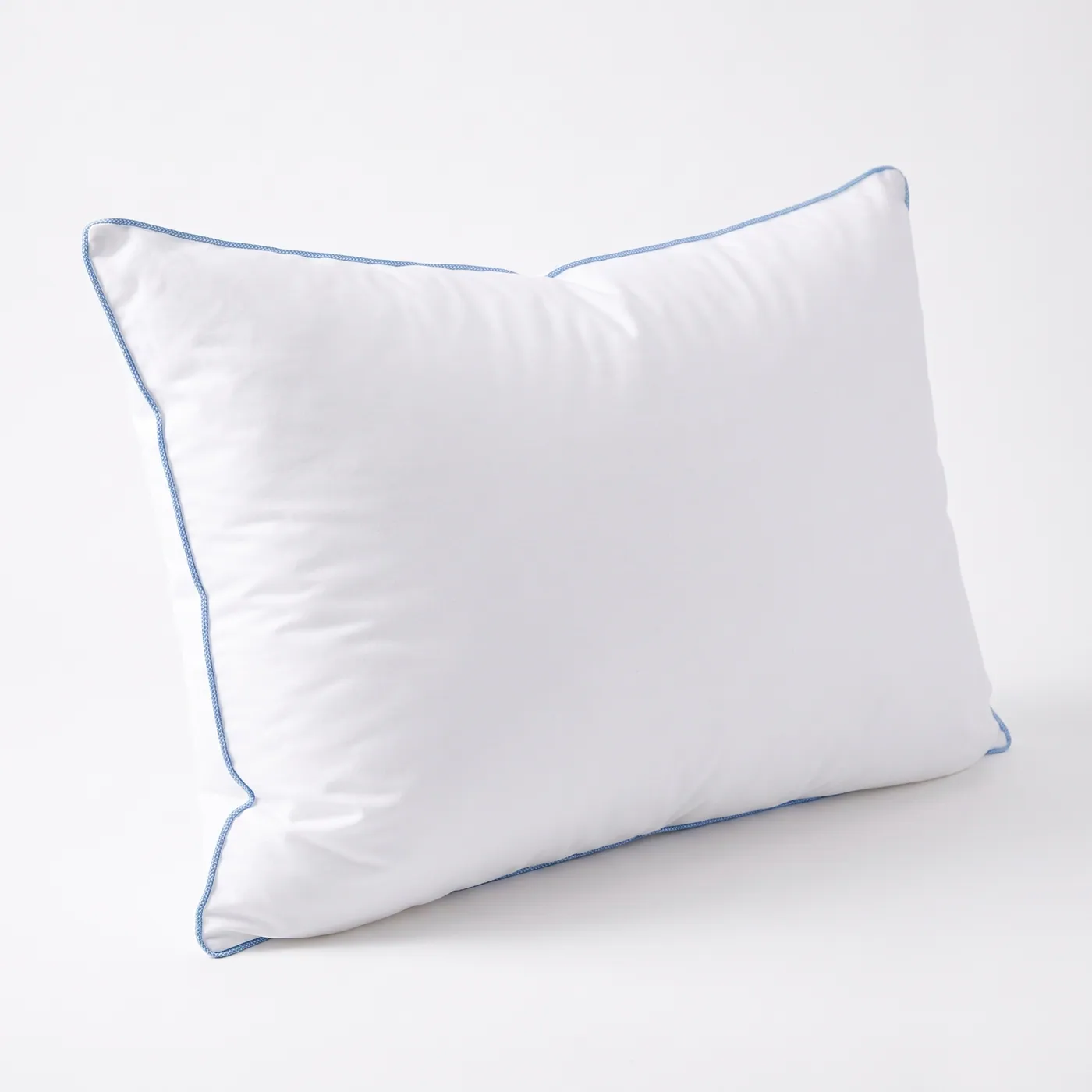 Elite Premium Fiber Water Pillow with blue corded edge on a light background